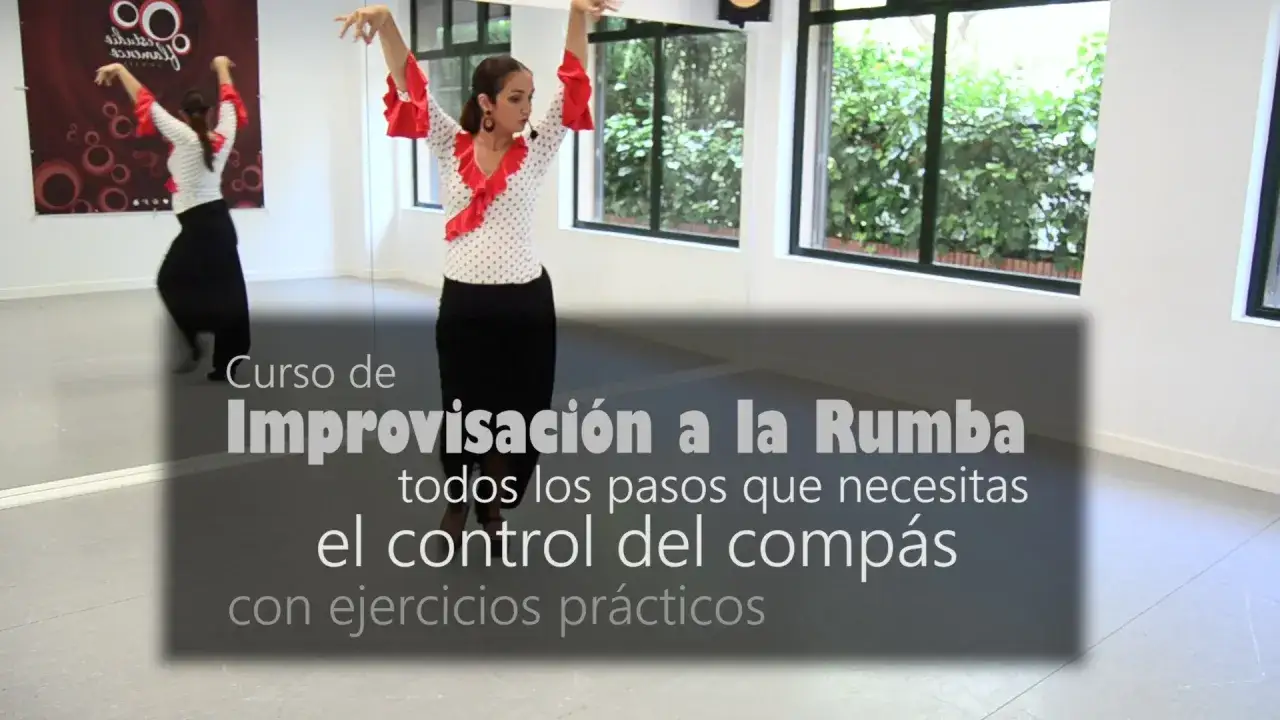 Mujer bailando rumba con falda negra y blusa de lunares. Aprende a improvisar y controlar el compás.